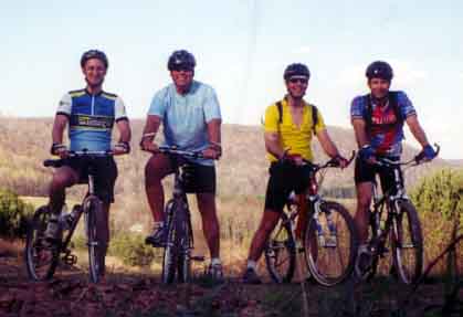 Mark, Ken, Bob, and Joe stop to enjoy the sunset.